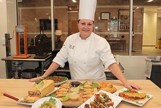 Culinary Arts Instructor showing food